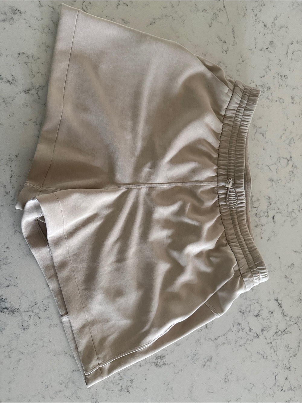 lululemon beige/taupe high-rise women’s athletic shorts - size 10
